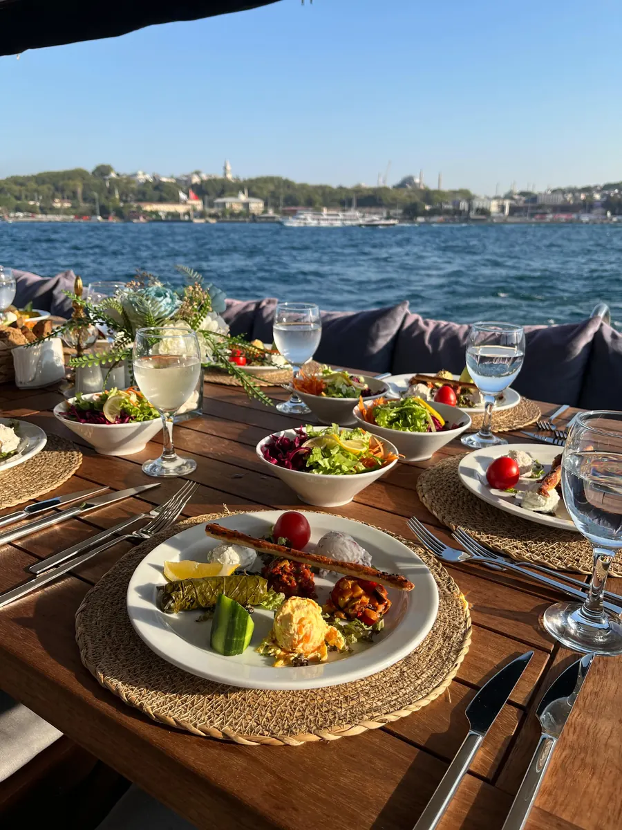 Lunch table on a yacht with a view of the Bosphorus