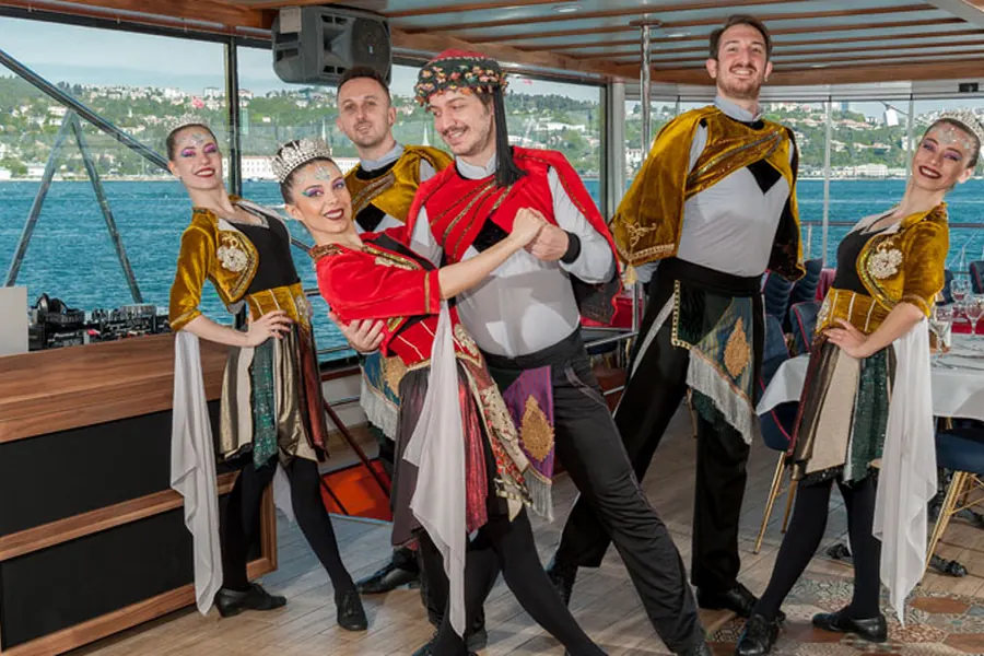 Folk dance group in colourful costumes on the dinner boat