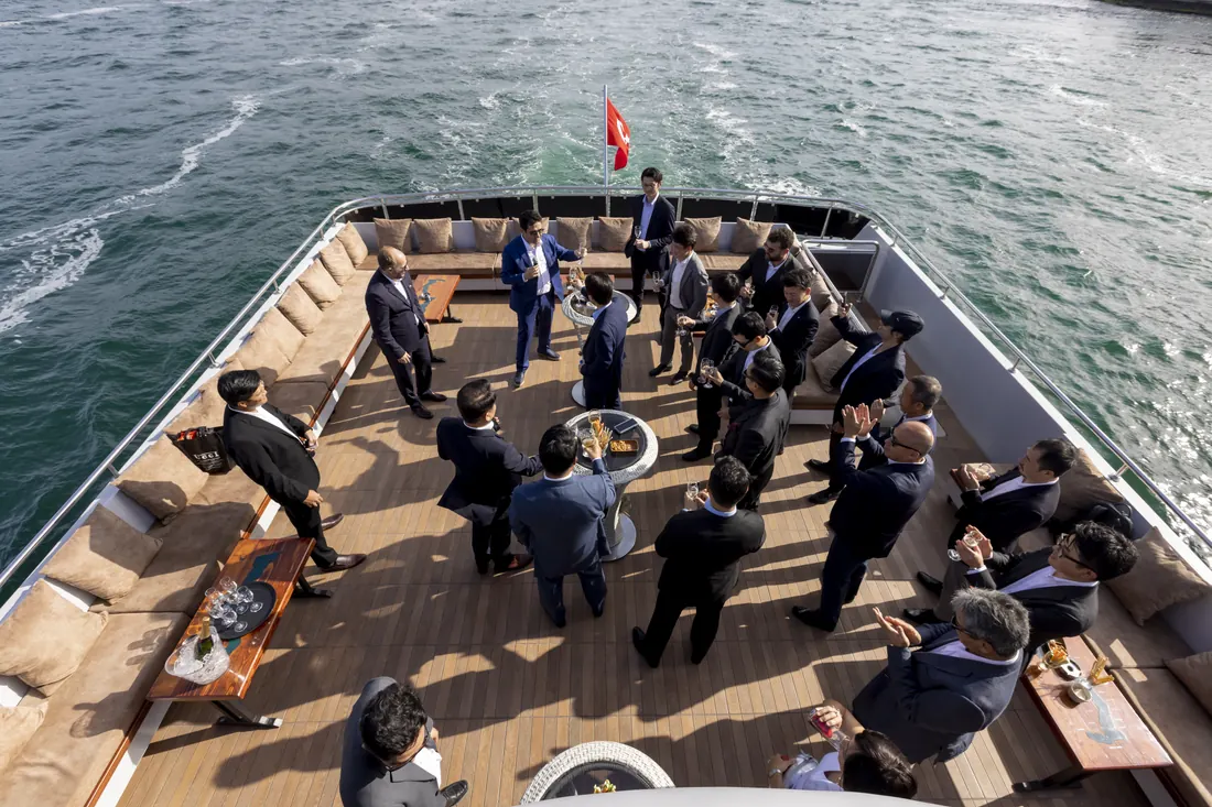 VIP guests on the aft deck of a yacht