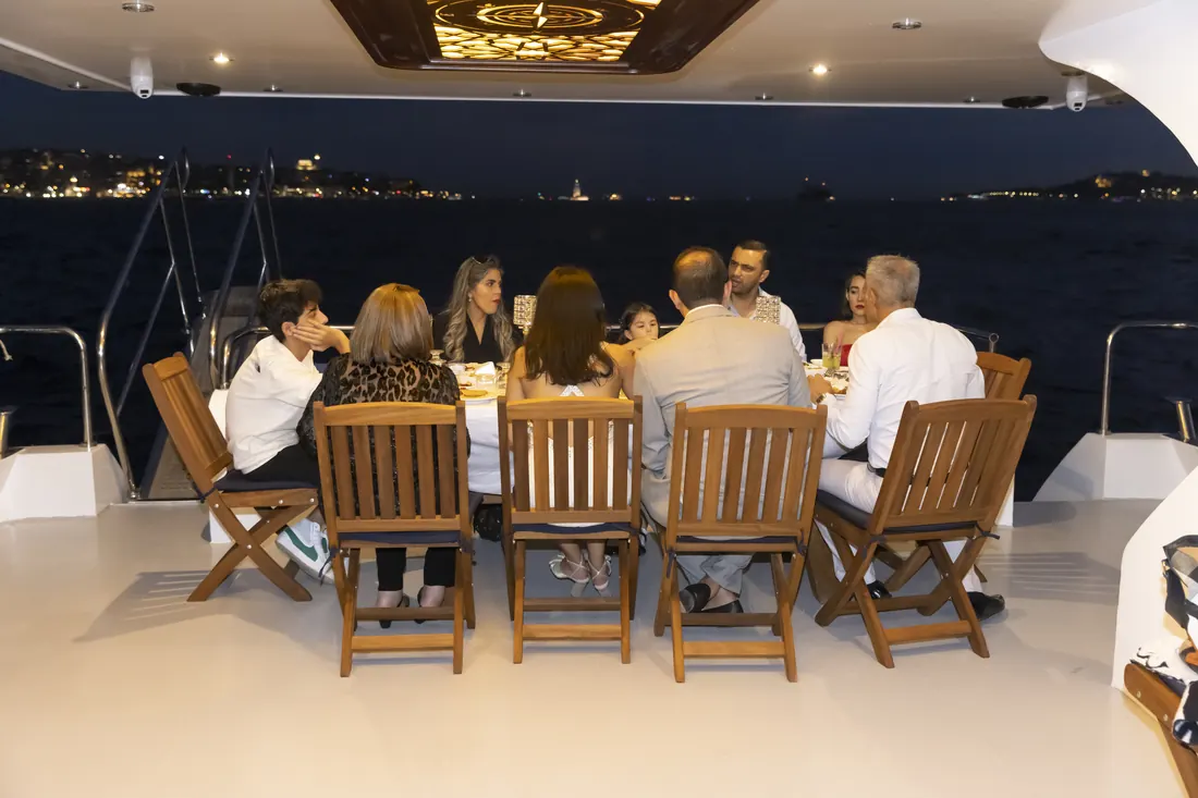 Family dinner on a yacht