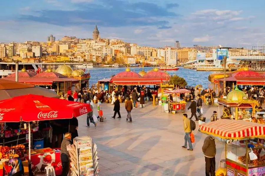 Food stalls on the Eminönü waterfront with Galata behind