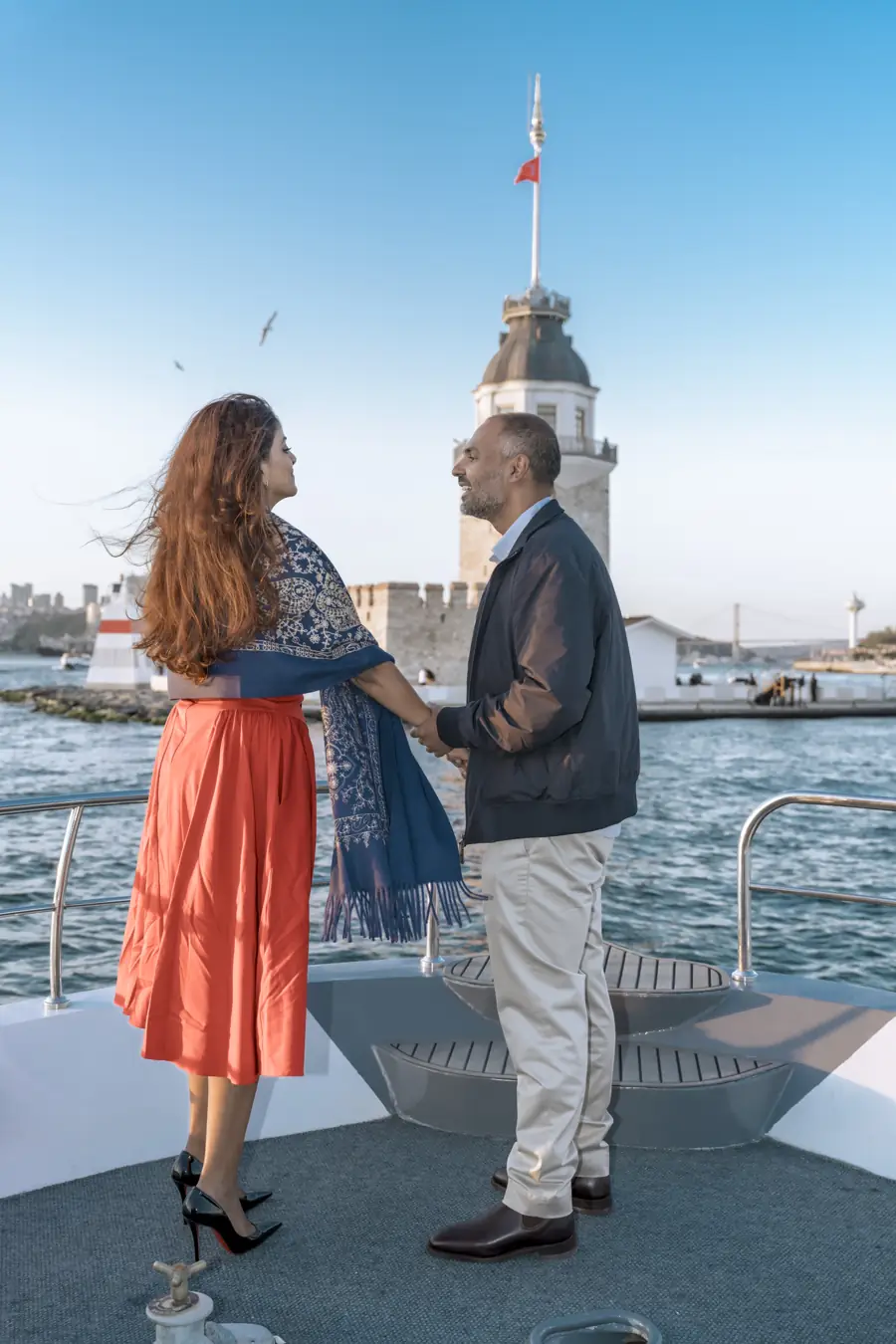Couple in front of the Maiden's Tower on a private yacht