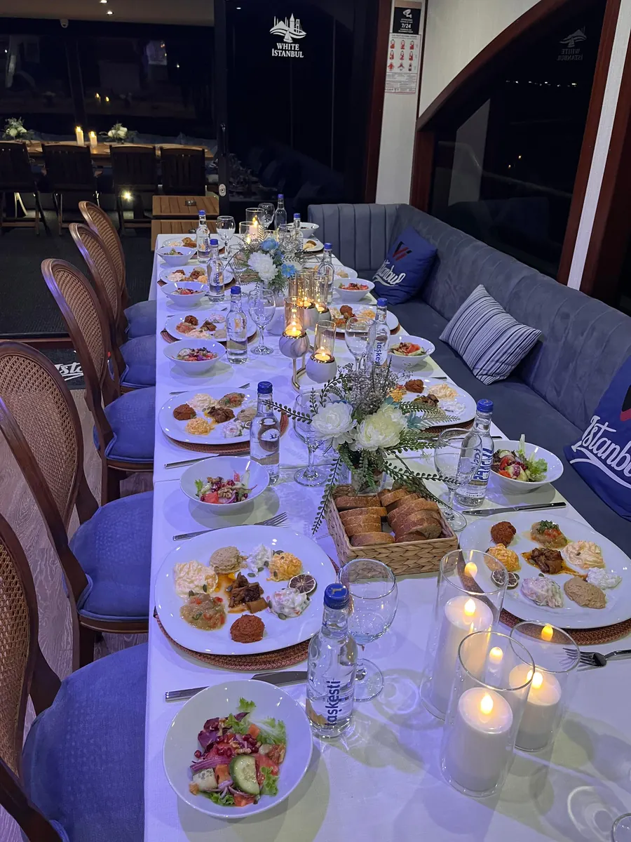 Dinner table with candles on a yacht