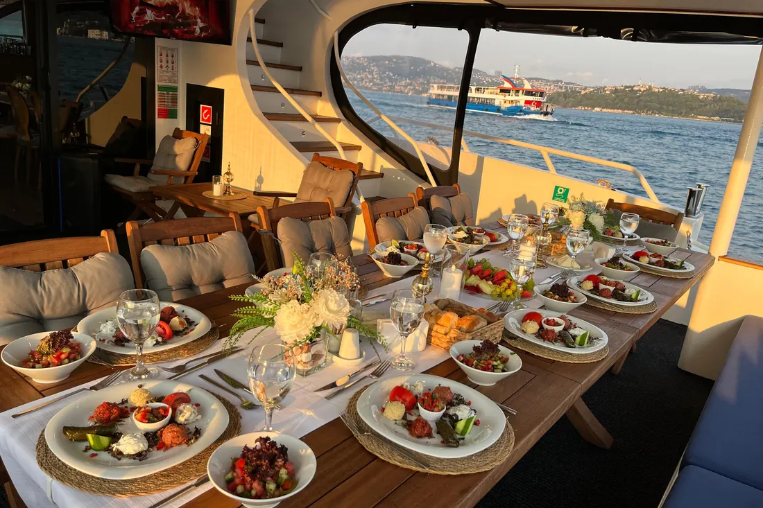 Lunch table with mezes set on a yacht on the Bosphorus