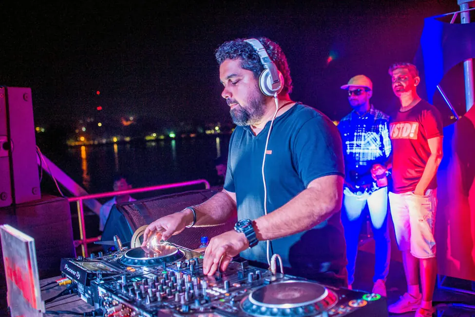 DJ at a company party on a yacht