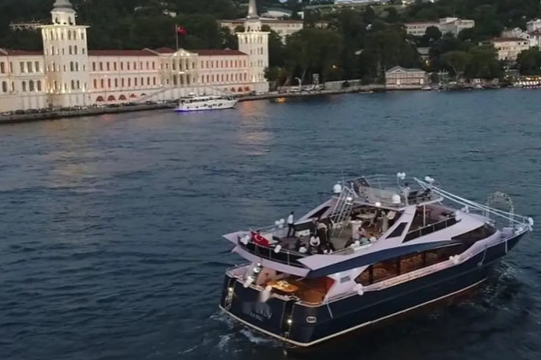 Reception yacht cruising past Kuleli on the Bosphorus