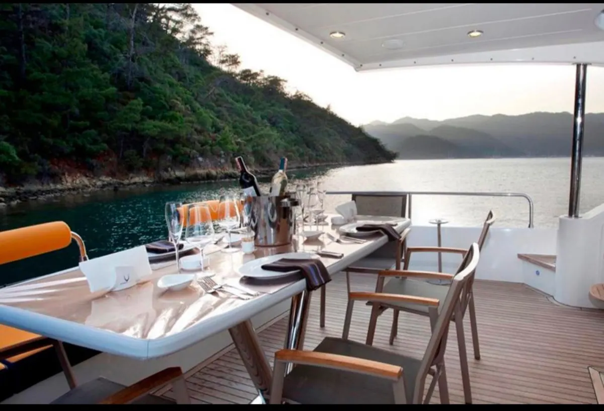 Aft deck dining table on Riviera